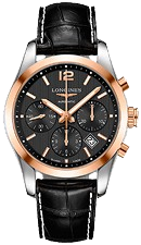 A luxury wristwatch with a black dial, gold-tone bezel, and chronograph features. It has a black leather strap and a sophisticated